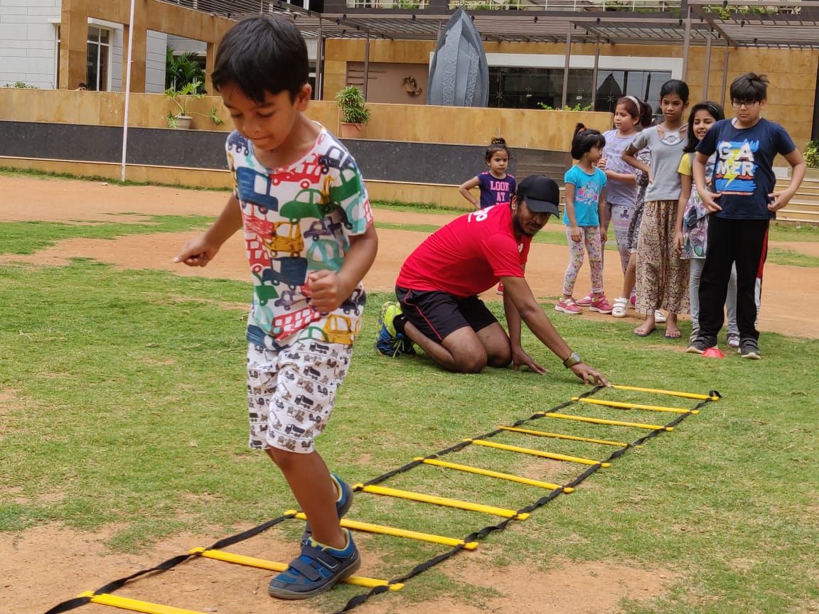 Kid kid doing ladder exercise in society | Ladder Exercises for Kids | Physical Fitness & Sports Training For Children
